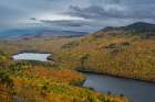 USA, Maine. Fall foliage and view of South Branch Ponds from Traveler Mountain, Baxter State Park. Art Print
